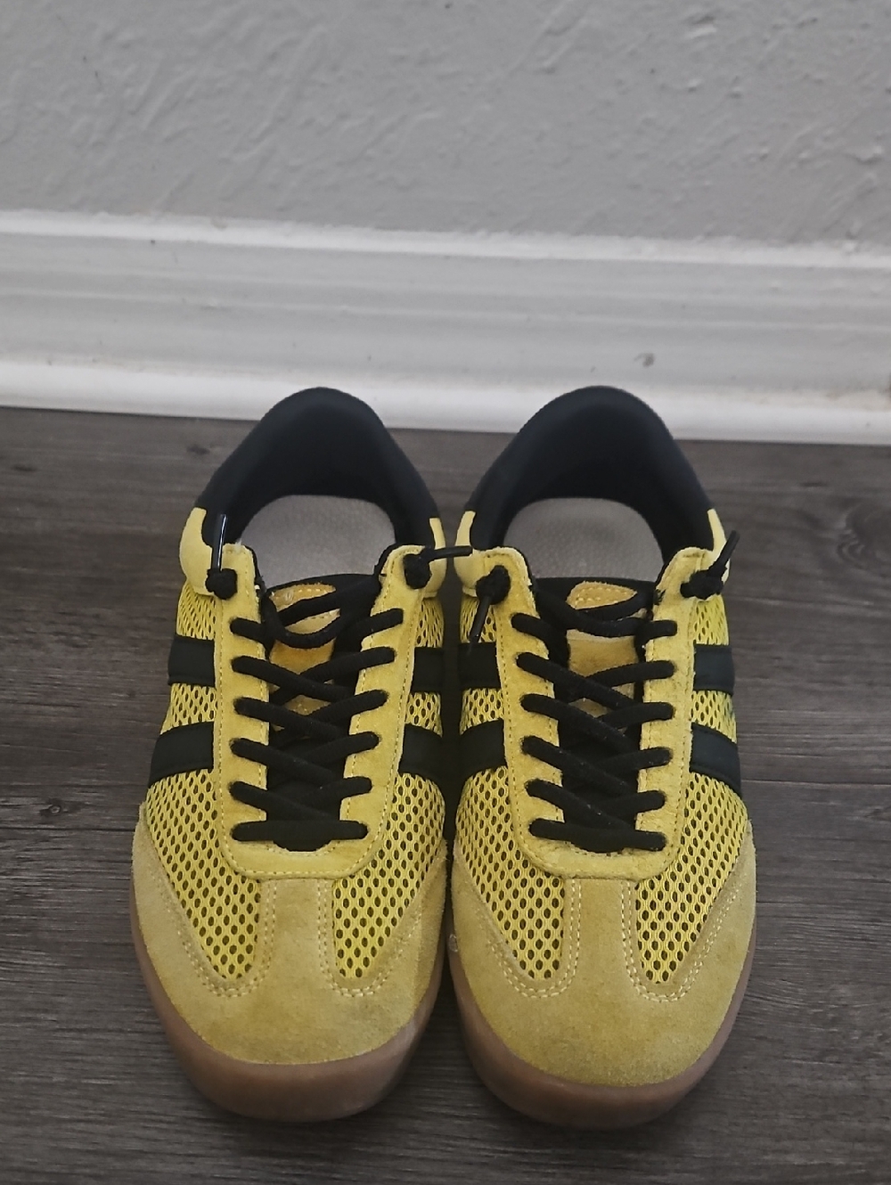 Adidas Women’s Yellow Athletic Sneakers with Black Stripes